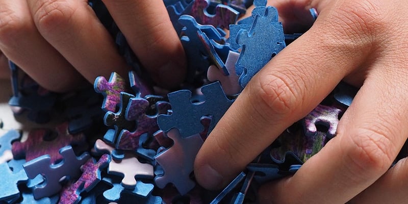 Puzzleteile als Symbol für die vielen Einsatzgebiete des Team Management Profils